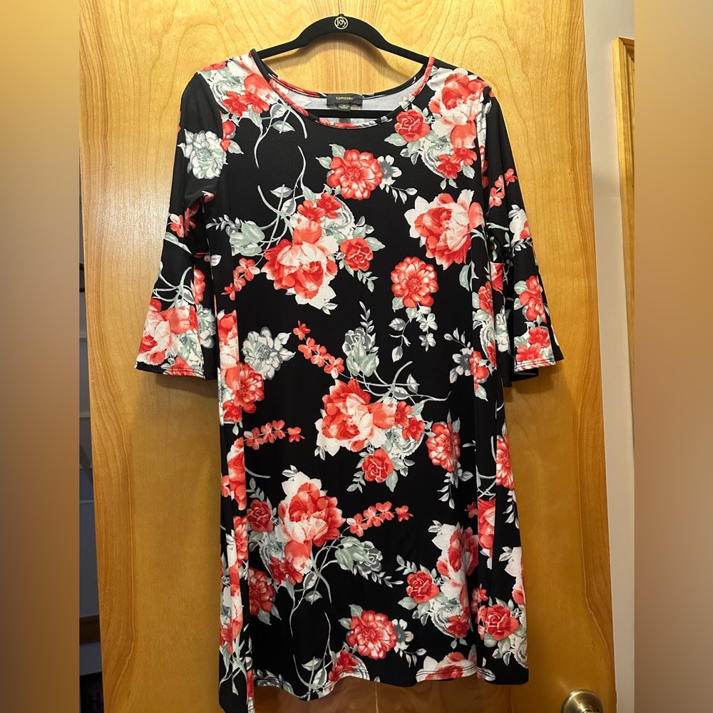 Espresso black floral dress with bell sleeves.